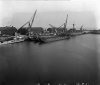 7101, 7104 LCT(3) and a corvette being fitted out in Hendon Dock, 1944.jpg