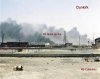 Dunkirk oil tanks on fire from railway colour kb.jpg