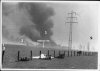 Robert Capa - Smoke Plumes.jpg