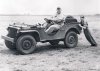 Unfit driver in jeep with skinny guy pushing Both wearing coveralls.jpg