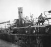 BEF 1940 blown up small ship Dunkirk shell holes in side.jpg