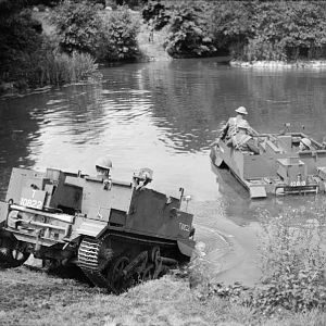 Universal carriers of the Welsh Guards fording a stream, 13 July 1940, IWM H 2208