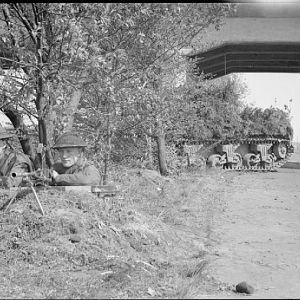 Sherman Firefly & infantry of the Irish Guards, Bremen-Hamburg autobahn, 20 April 1945; IWM BU 4157