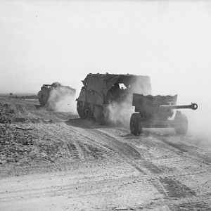 Loyd carriers and 6-pdr anti-tank guns of 3rd Irish Guards advance during Operation 'Goodwood', 18 July 1944; IWM B 7529