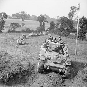 Stuart & Sherman tanks of 2nd Irish Guards, Guards Armoured Division, south of Caumont, 31 July 1944; IWM B 8275