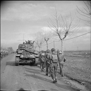 Sherman tank of 46th Royal Tank Regiment supporting Irish Guardsmen north of Anzio, 25 January 1944.