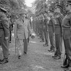 Prime Minister Winston Churchill inspecting a guard of honour of the Scots Guards at British Headquarters, Berlin; IWM BU 8888