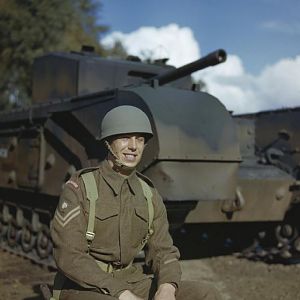 Corporal of the Grenadier Guards with a Churchill tank, Guards Armoured Training Wing, Pirbright, Surrey, October 1943; IWM TR 1407