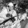 (IWM B13666) Lt 2IC officer of a reconnaissance patrol in snow camouflage, 15 January 1945.jpg