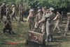 1940 BEF officer having first aid to his arm colour kb.jpg