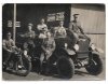 0008A101 Robert R Wainwright on the bonet of a 6x4 Morris Com Staff car c1938.JPG