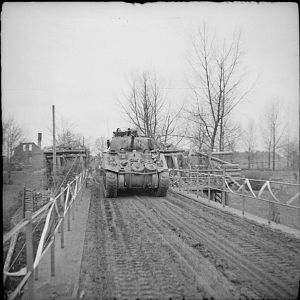 Sherman tanks of Guards Armoured Division crossing a bridge over the River Ems, 6 April 1945; IWM BU 3169