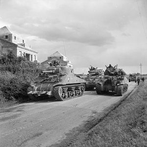 Sherman tanks of Guards Armoured Division advancing towards Arras, 1 September 1944.; IWM BU 269