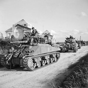 Sherman tanks of Guards Armoured Division passing through Fouilloy on their way to Arras, 1 September 1944; IWM BU 272